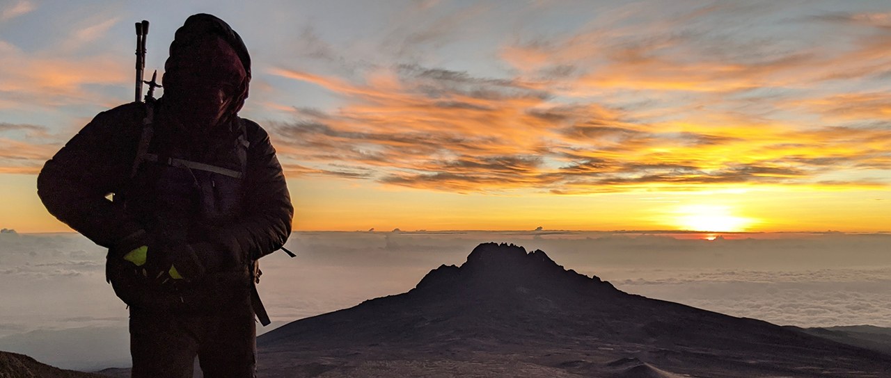 Sunrise over a sea of clouds from Kilimanjaro